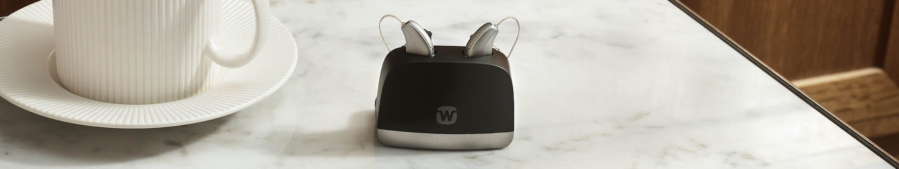 Widex Allure charger on the table