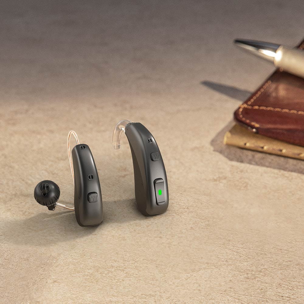 Widex Moment mRIC hearing aid on table